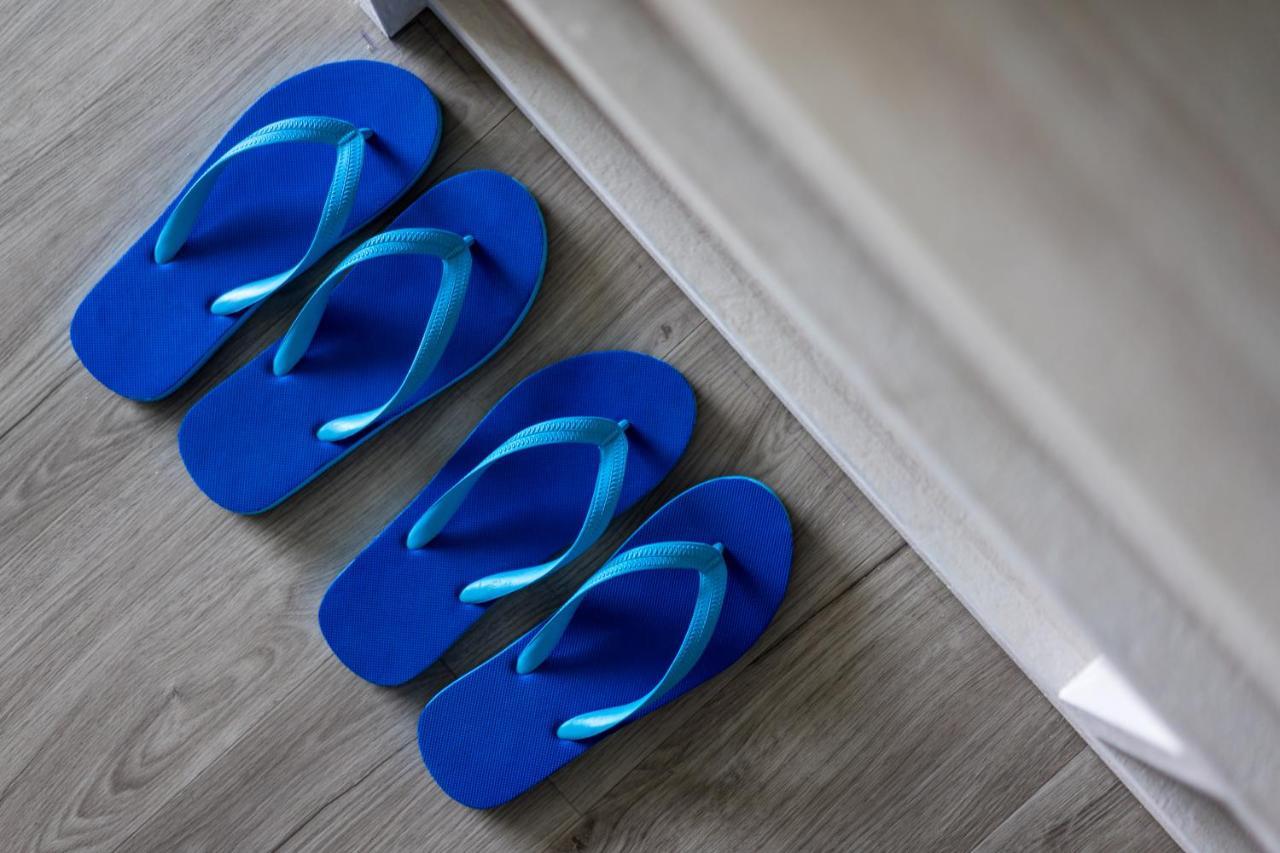 Seabed Grand Hotel Phuket - Sha Extra Plus Exterior foto Flip-flops